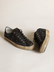 V-Star in midnight-blue denim with black leather star and toe
