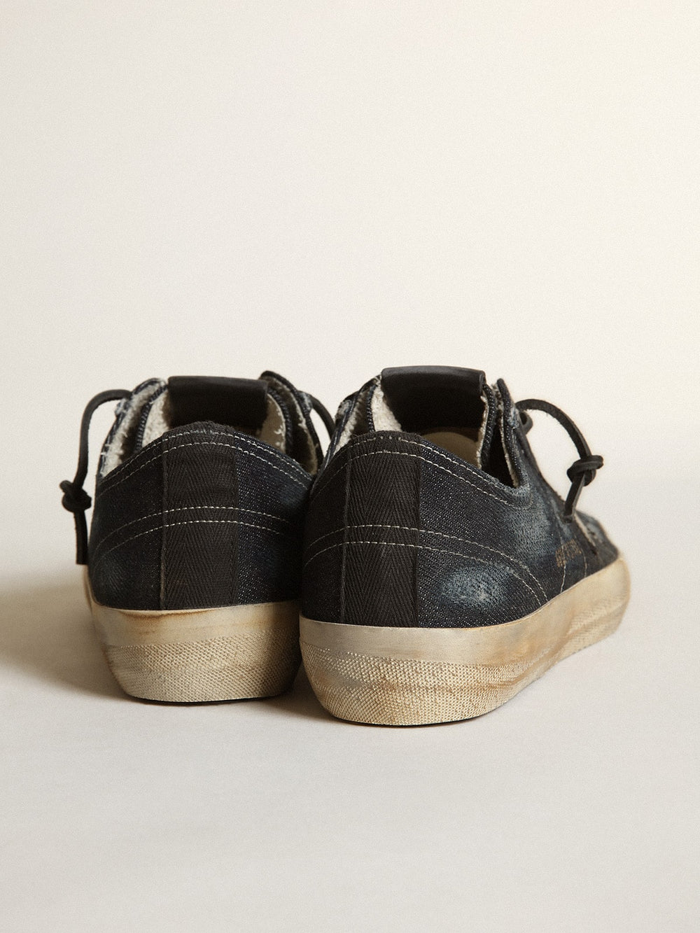 V-Star in midnight-blue denim with black leather star and toe