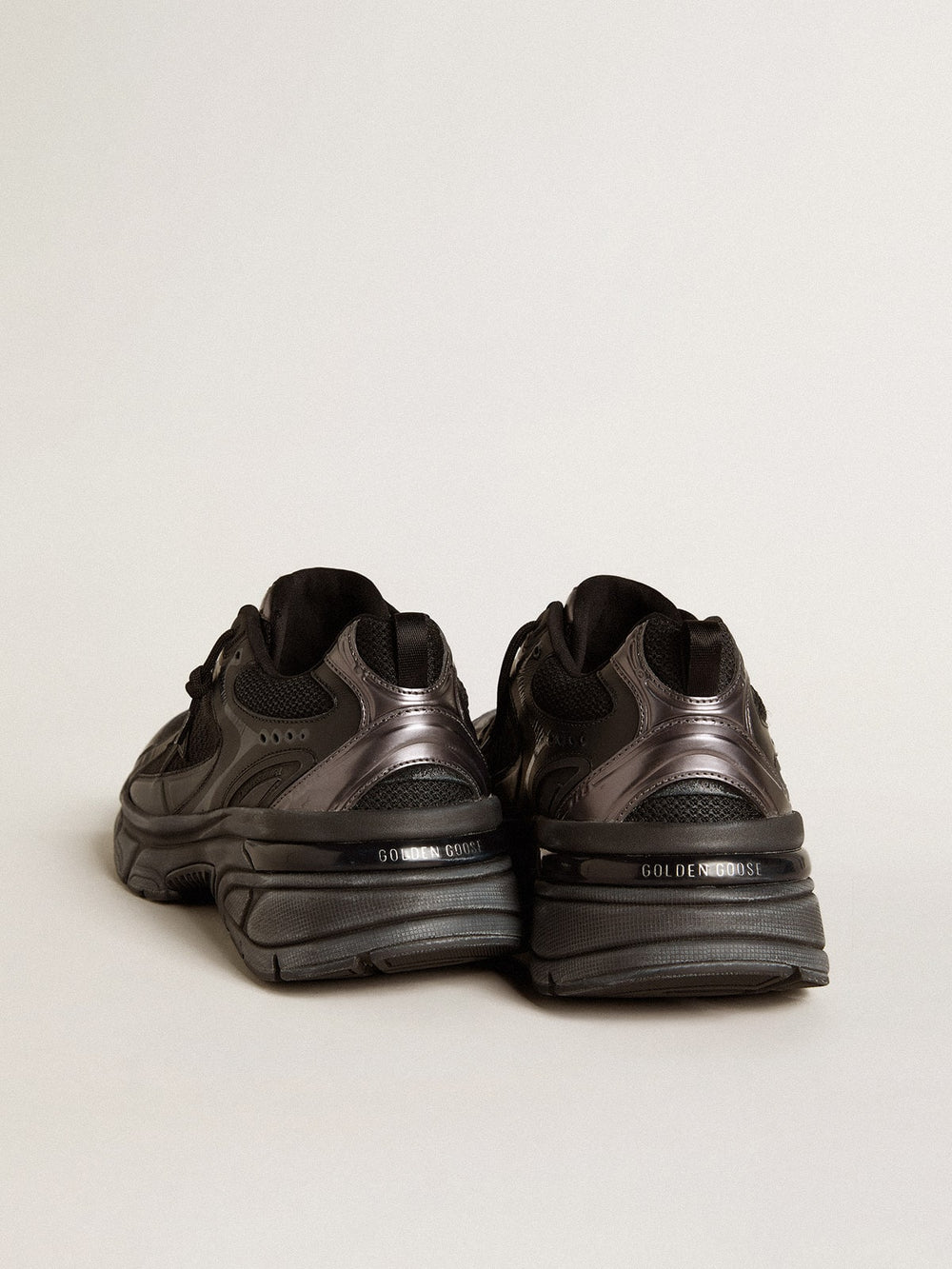 Women’s Lightstar with black leather and mesh upper and black star
