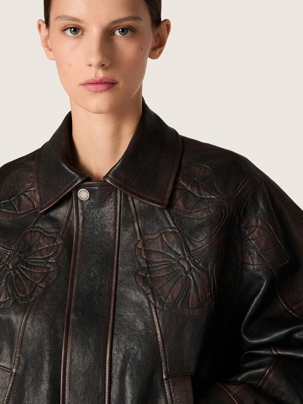 Women's bomber jacket in dark burgundy nappa leather with floral embroidery