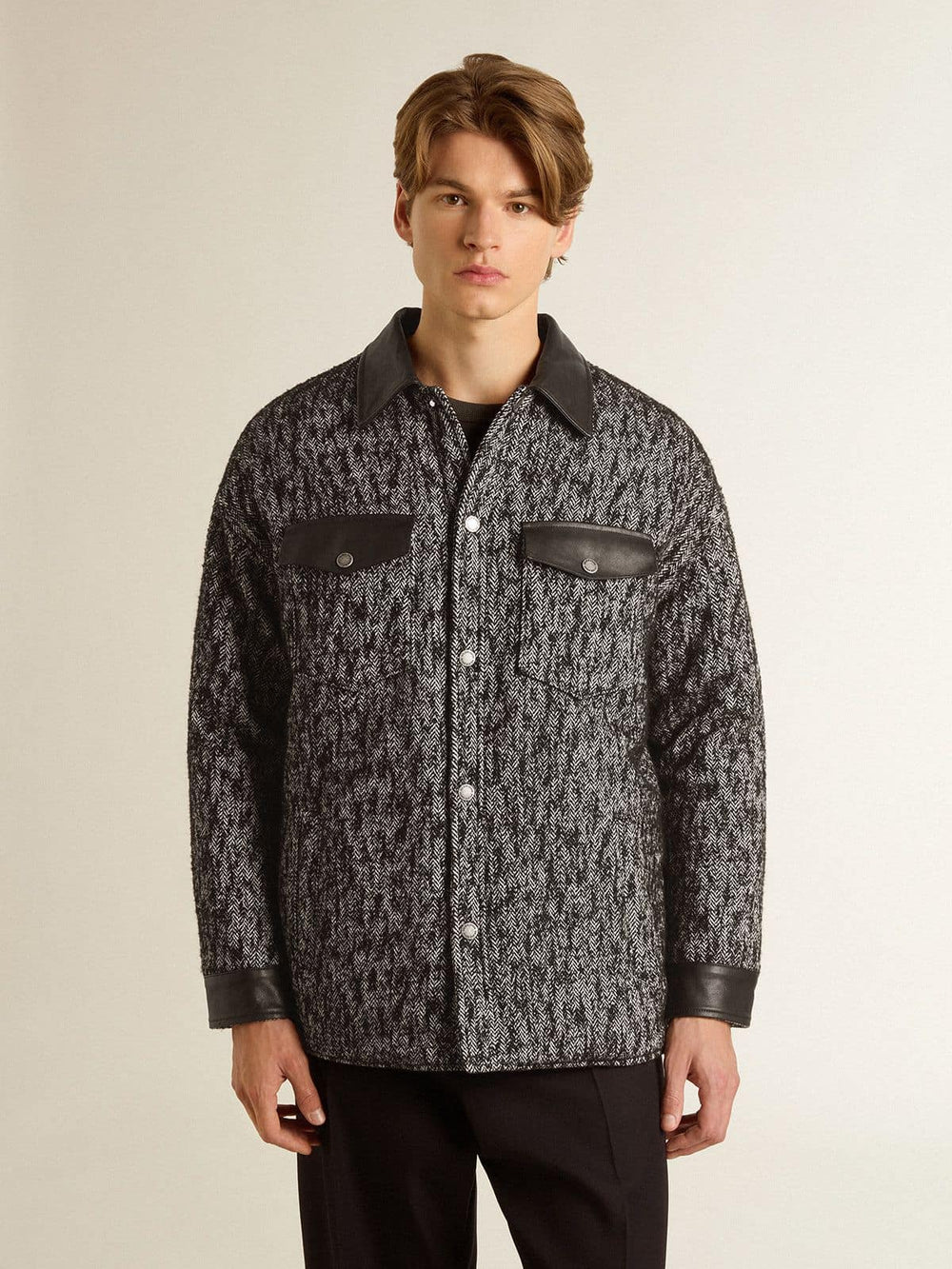Gray herringbone jacket with black leather details