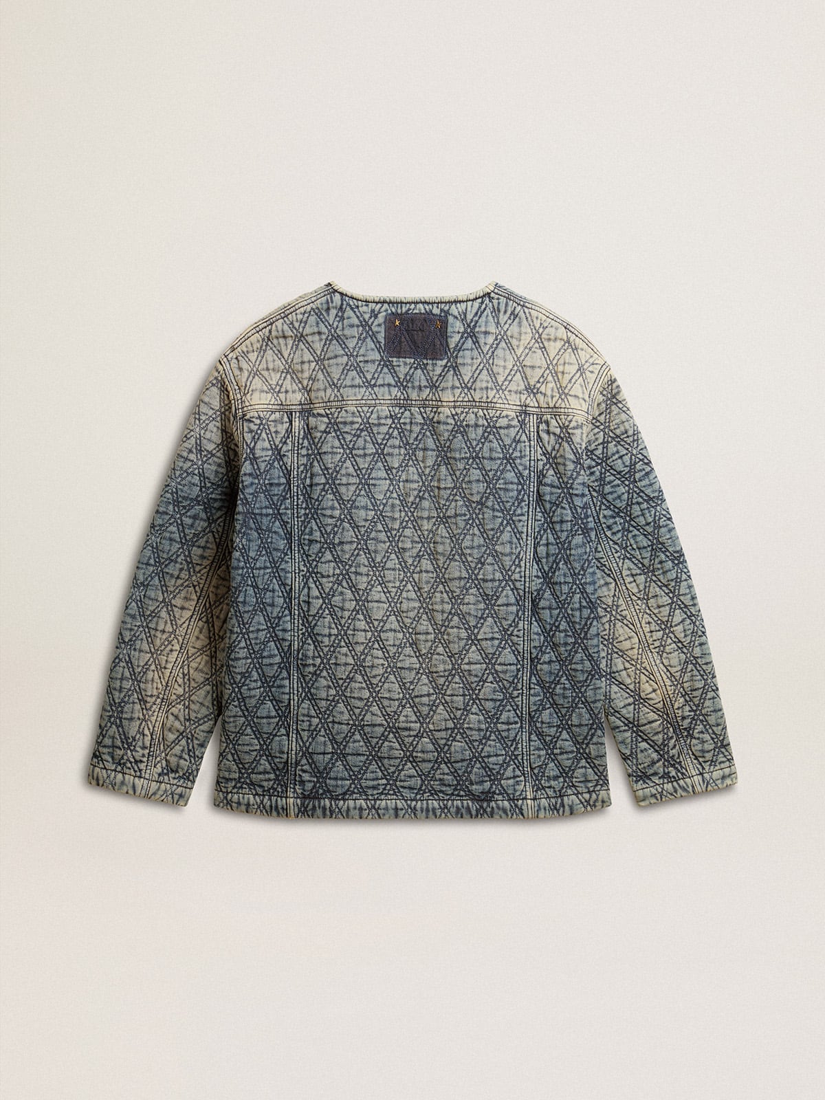 Women's blue quilted jacket in cotton denim with distressed finish