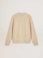 Women's beige sweater with 'Golden' lettering on the back