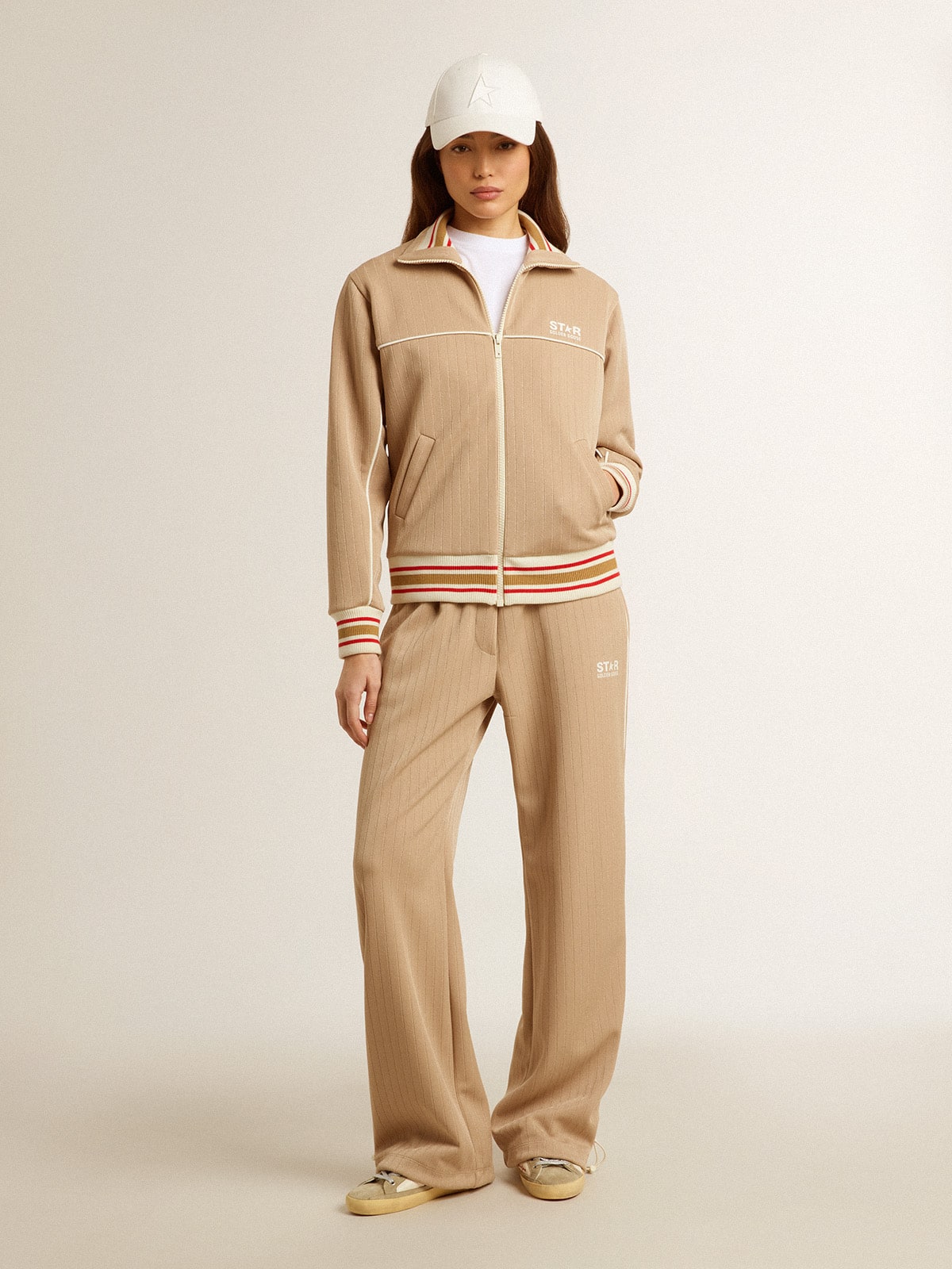 Women’s light beige zipped sweatshirt with white logo