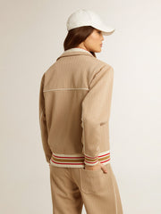 Women’s light beige zipped sweatshirt with white logo