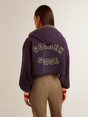 Dark blue cropped sweatshirt with zip fastening and embroidered hood