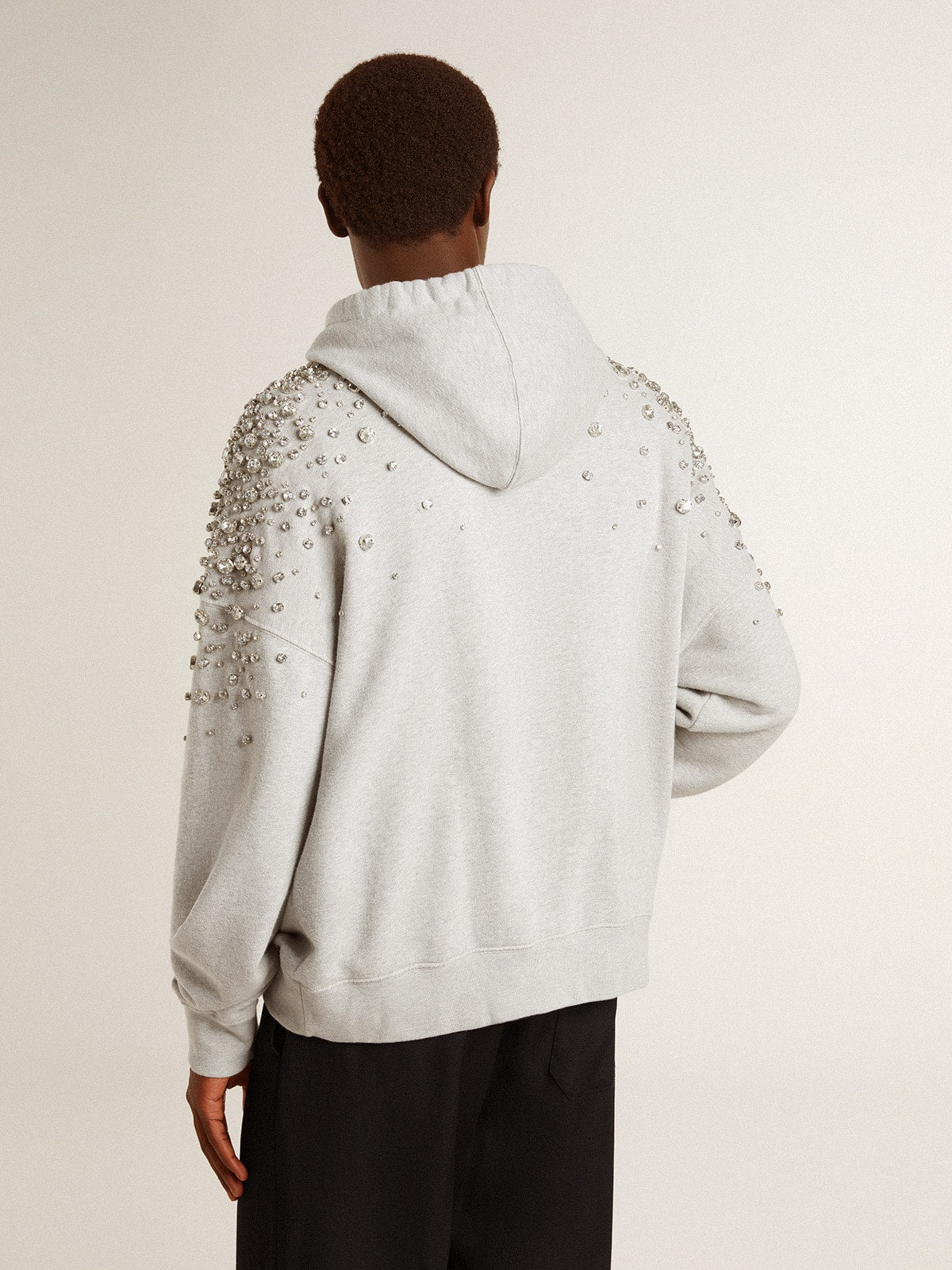 Gray hooded sweatshirt with crystal decoration