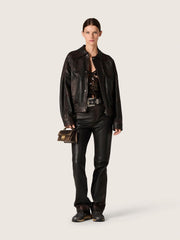 Women's pants in dark burgundy nappa with vintage finish
