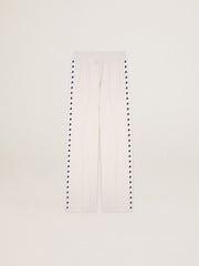 Women’s white joggers with stars on the sides