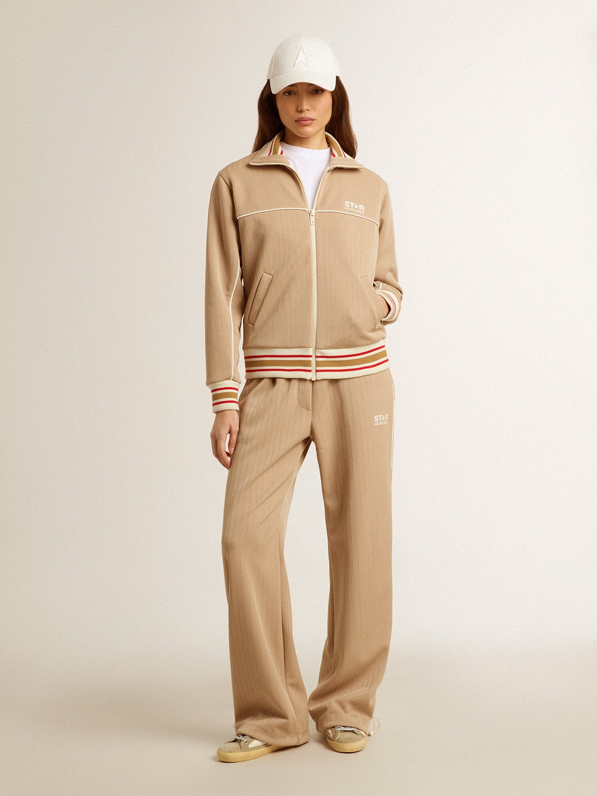 Women’s light beige joggers with white logo