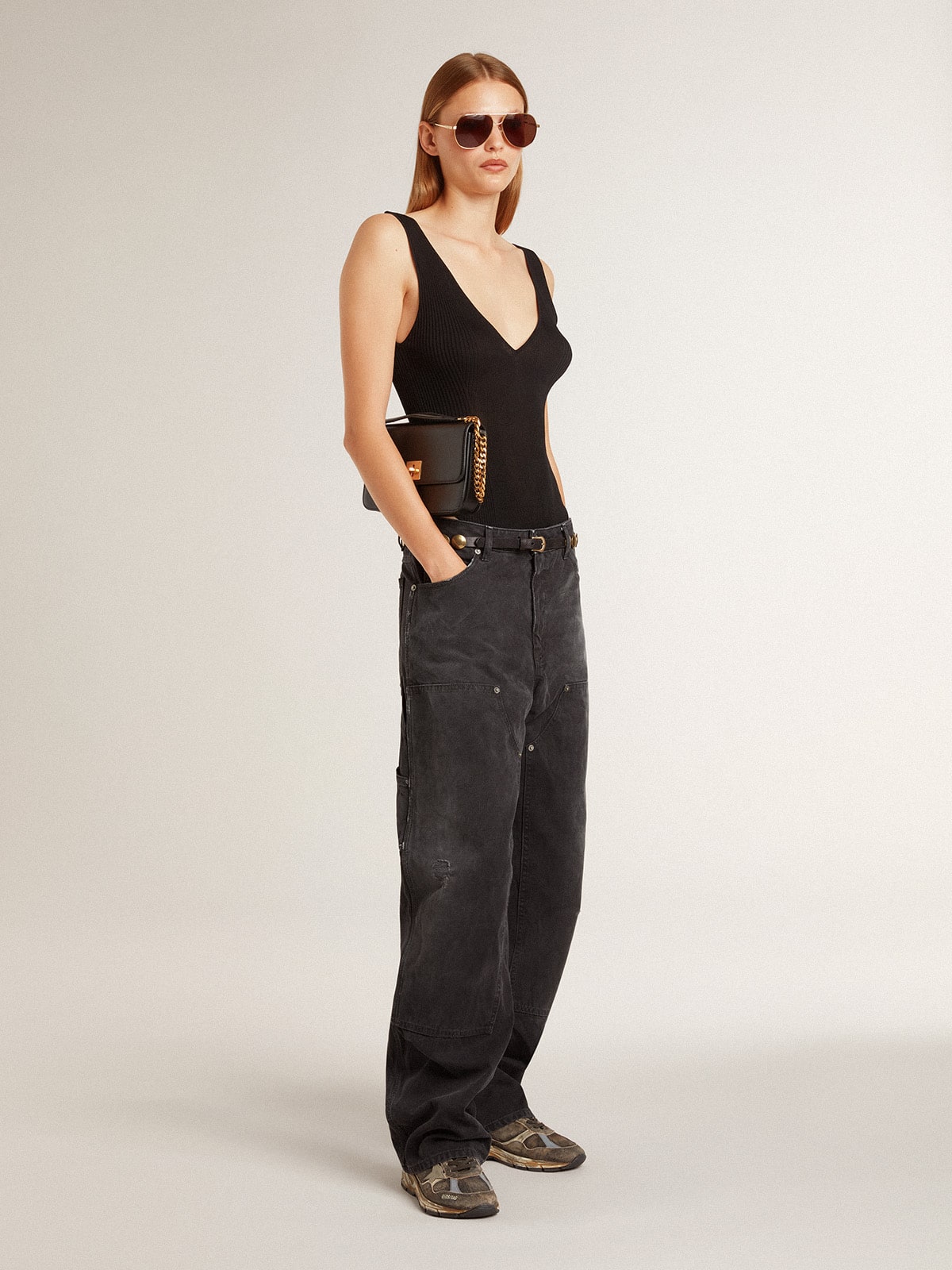 Women's distressed black cotton jeans with front patches