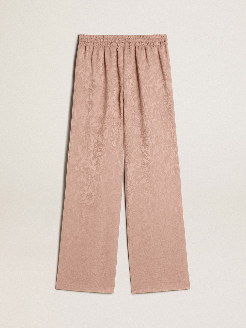 Women's pink viscose pants with floral pattern