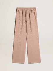 Women's pink viscose pants with floral pattern