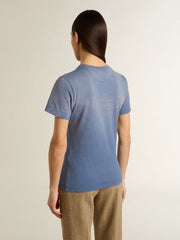Women's faded light blue T-shirt with print on the chest