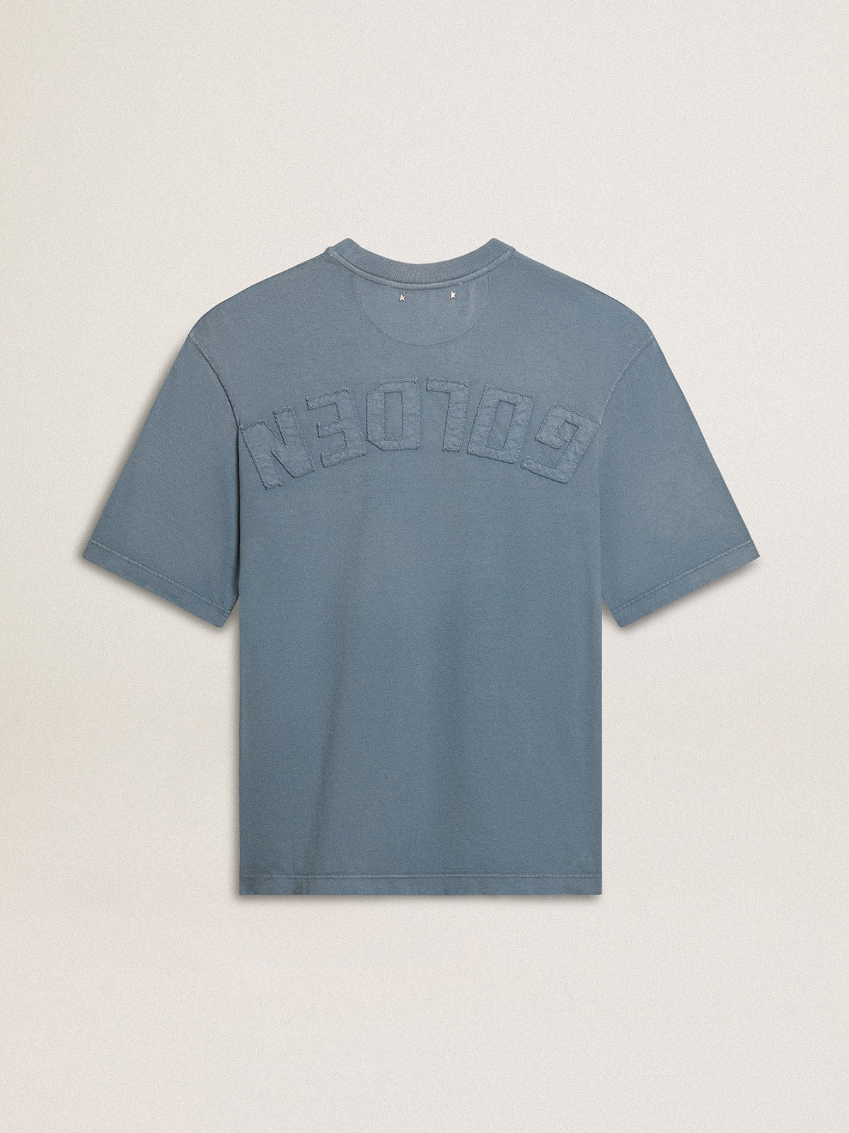 Unisex cotton T-shirt in baby blue with reverse print on the back