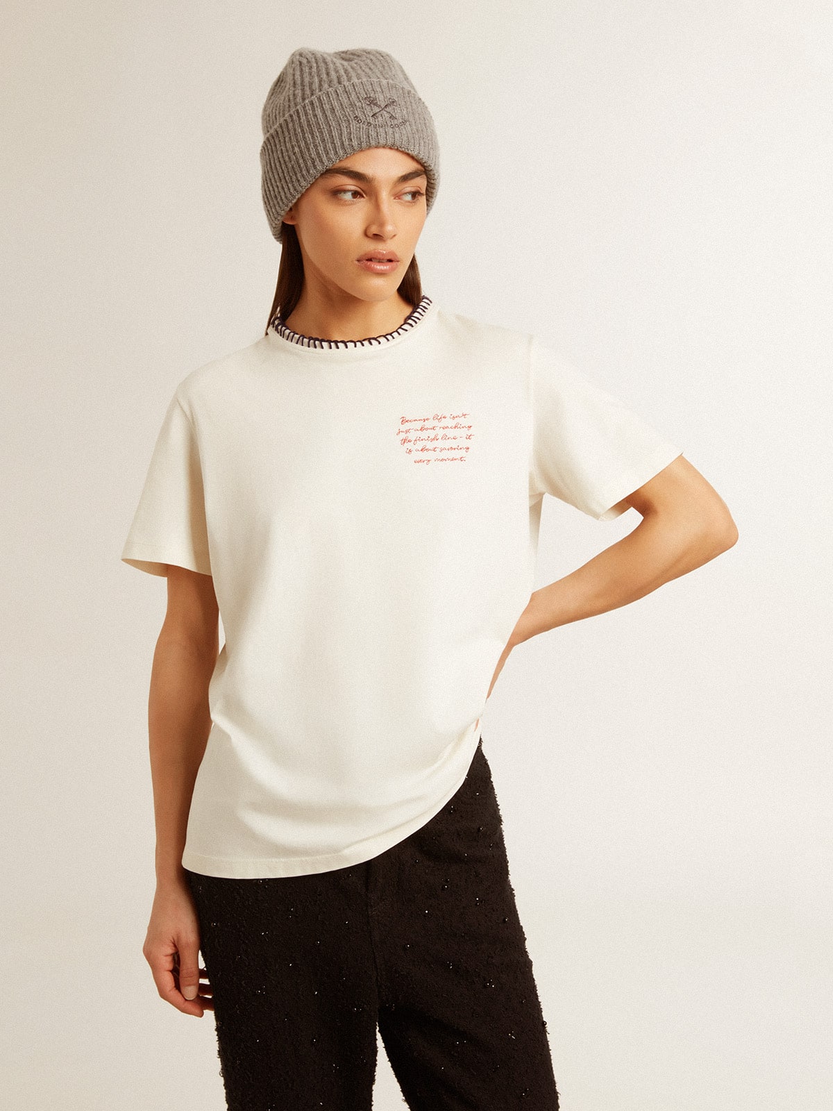 Women's aged white cotton T-shirt with hand embroidery