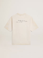 Worn-white unisex T-shirt with printed lettering