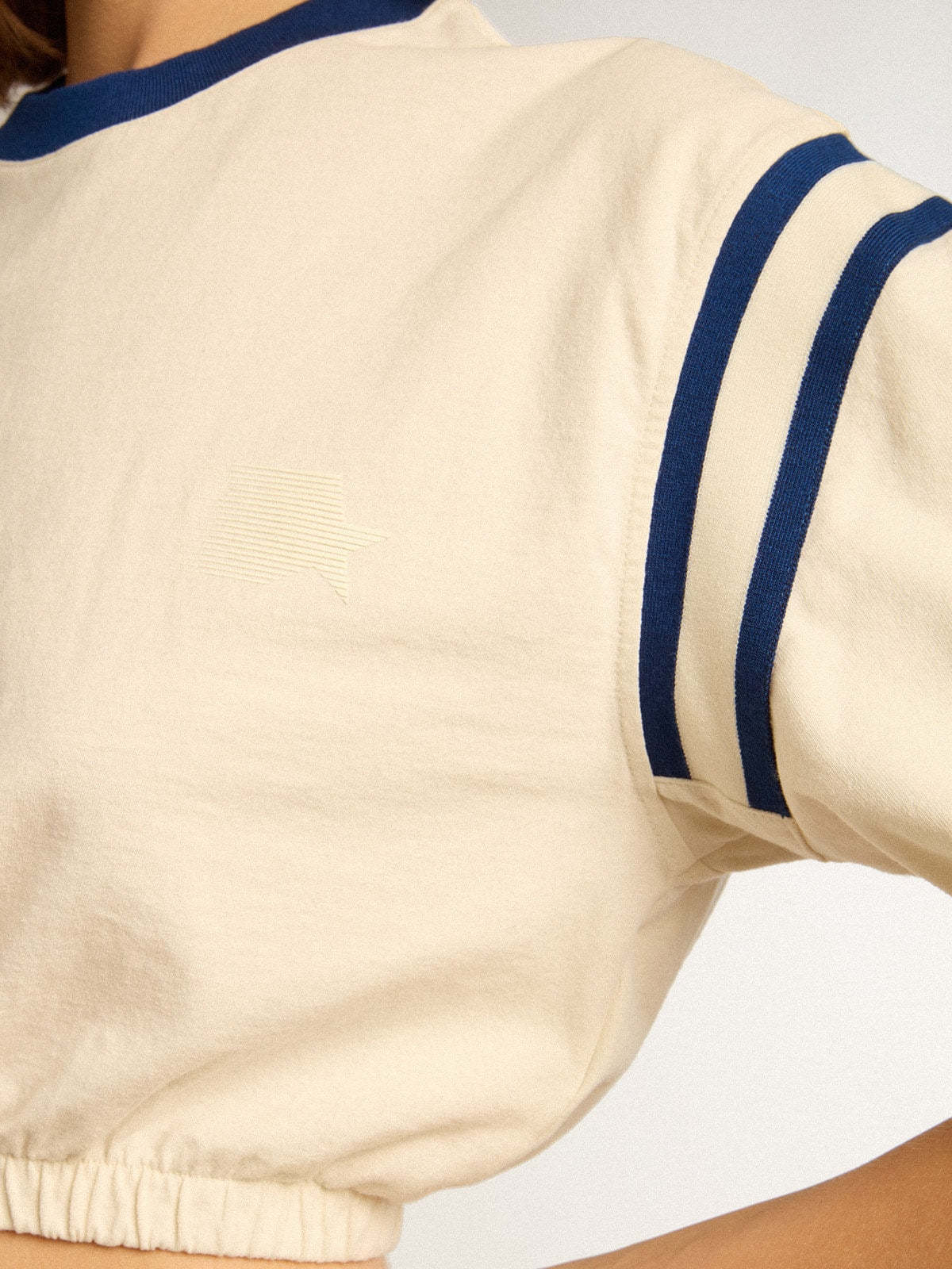 Aged white cotton cropped T-shirt with lettering on the back