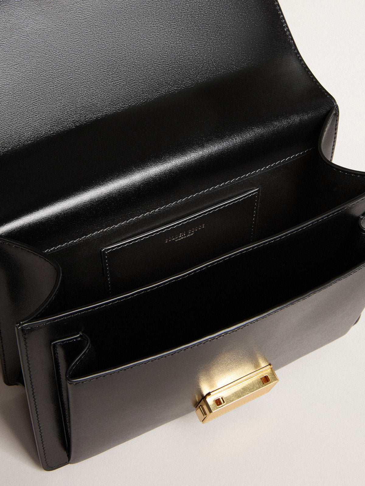 Venezia Bag in black boarded leather with scarf and double charm