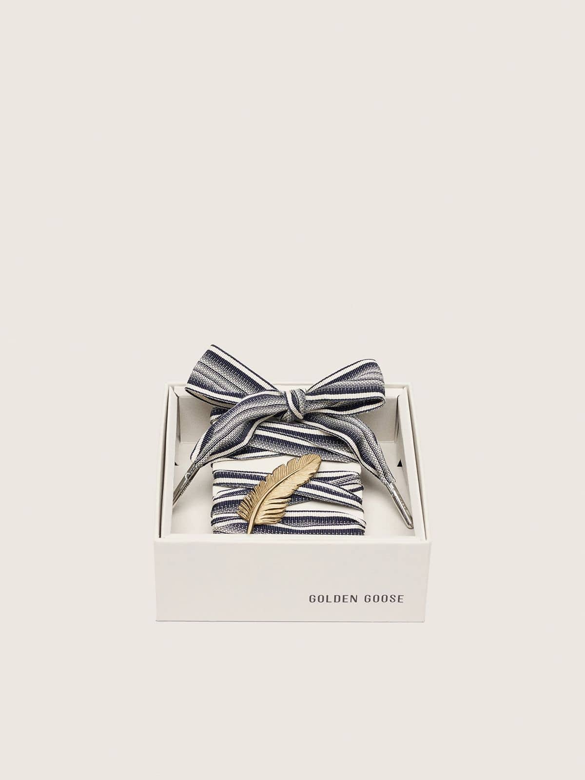 Skins striped laces with gold feather charm