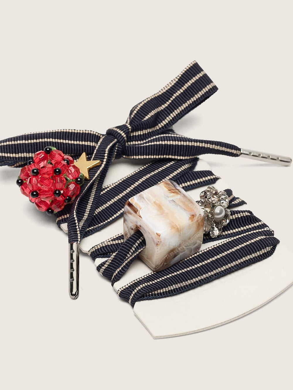 Skins blue and beige striped laces with raspberry, stone and crystal charms