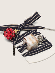 Skins blue and beige striped laces with raspberry, stone and crystal charms