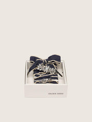 Skins denim blue laces embellished with beige trim and two charms