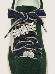 Skins denim blue laces embellished with beige trim and two charms