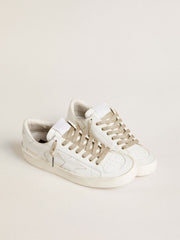 Gold-colored Lurex laces with contrasting white logo