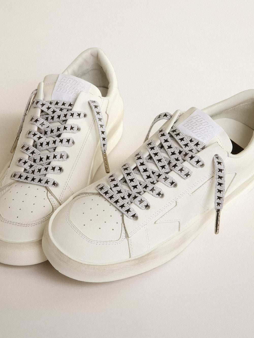 Ice-gray cotton laces with contrasting black stars