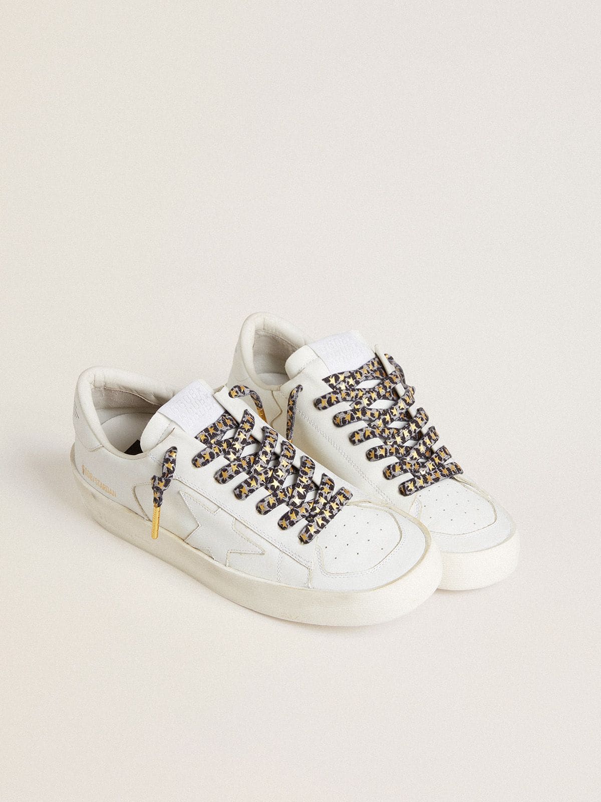 Laces with gray and black animal print with contrasting gold stars