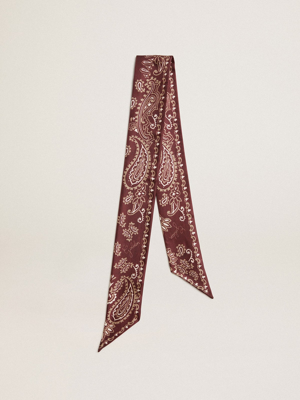 Ribbon in burgundy silk twill with paisley pattern