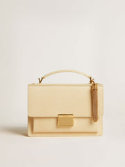Tassel-shaped charm in antique gold-colored brass