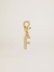 Letter F charm in gold-colored brass with crystals