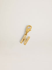 Letter N charm in gold-colored brass with crystals