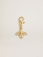 Bee-shaped charm in gold-colored brass with crystals