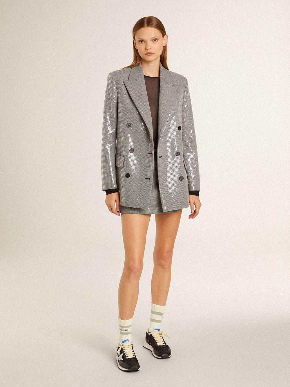 Worn-white socks with distressed details and sage-green stripes