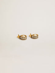 Earrings with gold star and pearl