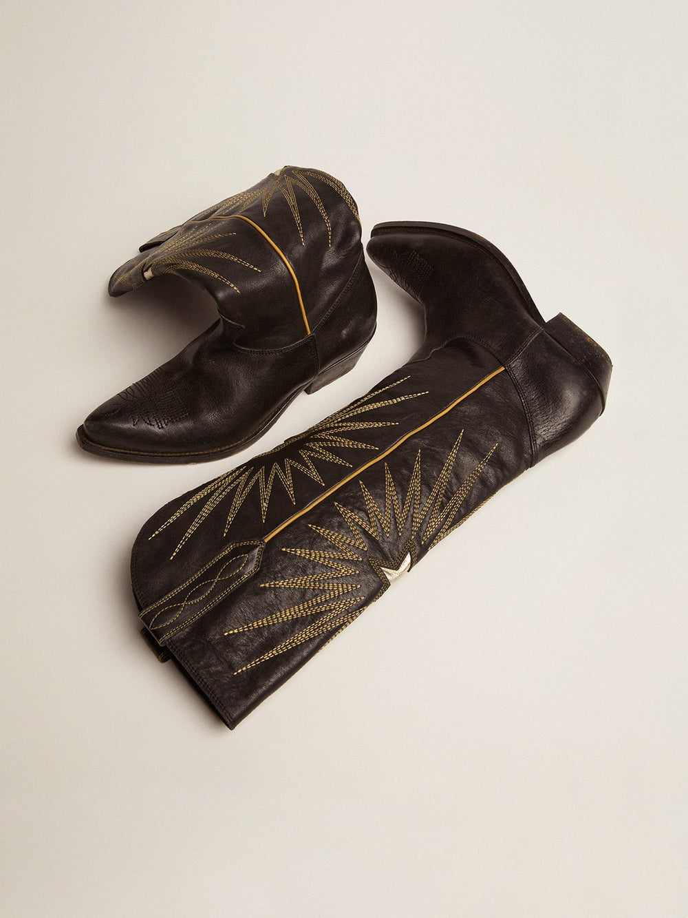 Wish Star boots in black leather with platinum laminated leather inlay star