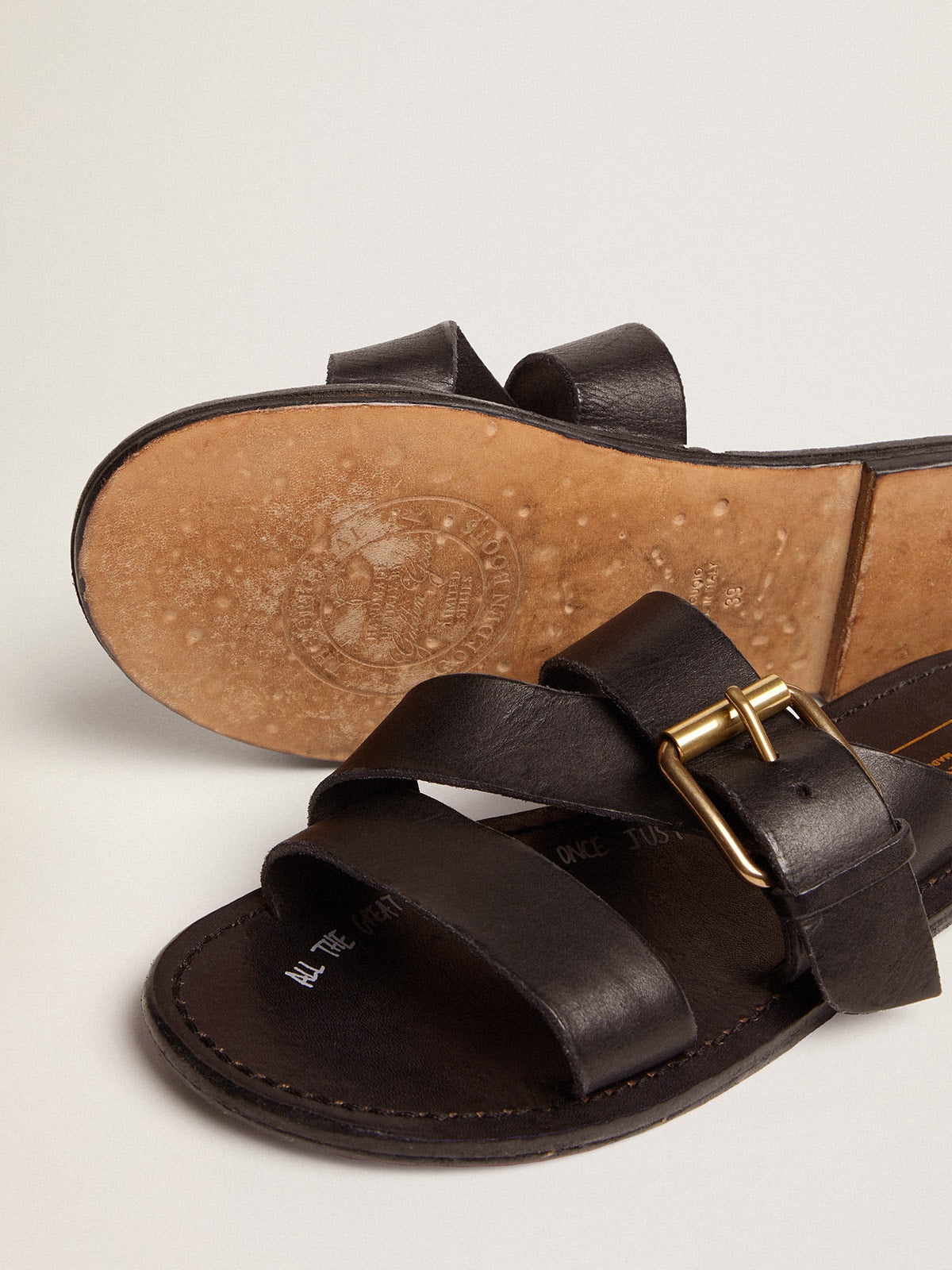 Black leather flat sandals with buckle Margaret | Golden Goose