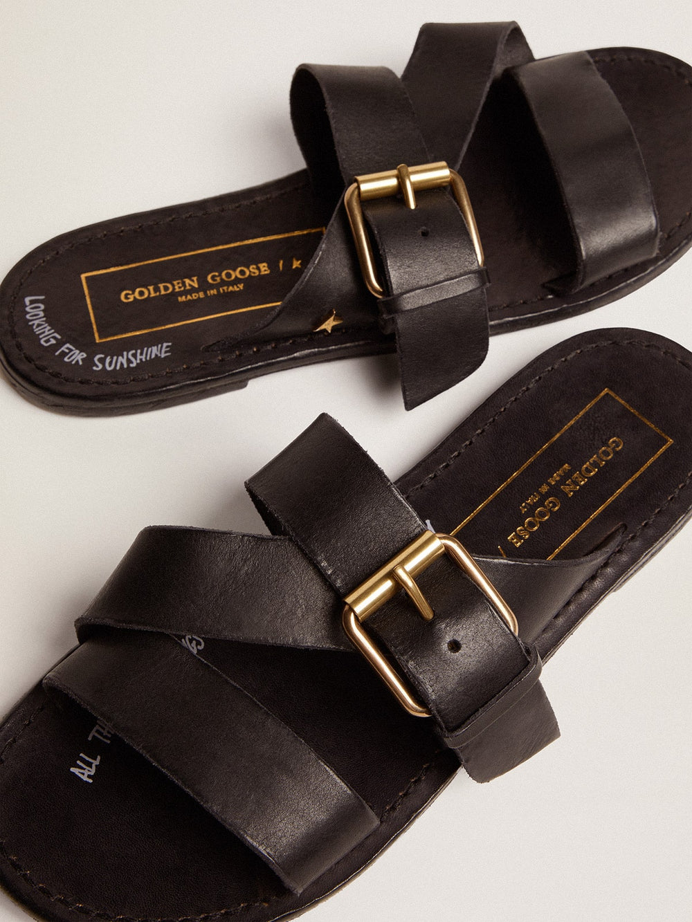 Black leather flat sandals with buckle Margaret | Golden Goose