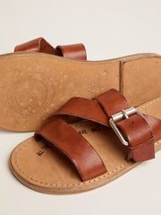 Margaret flat sandals in resin-coated leather