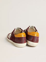 Men’s Super-Star in brick-red suede with white leather star and animal-print heel tab