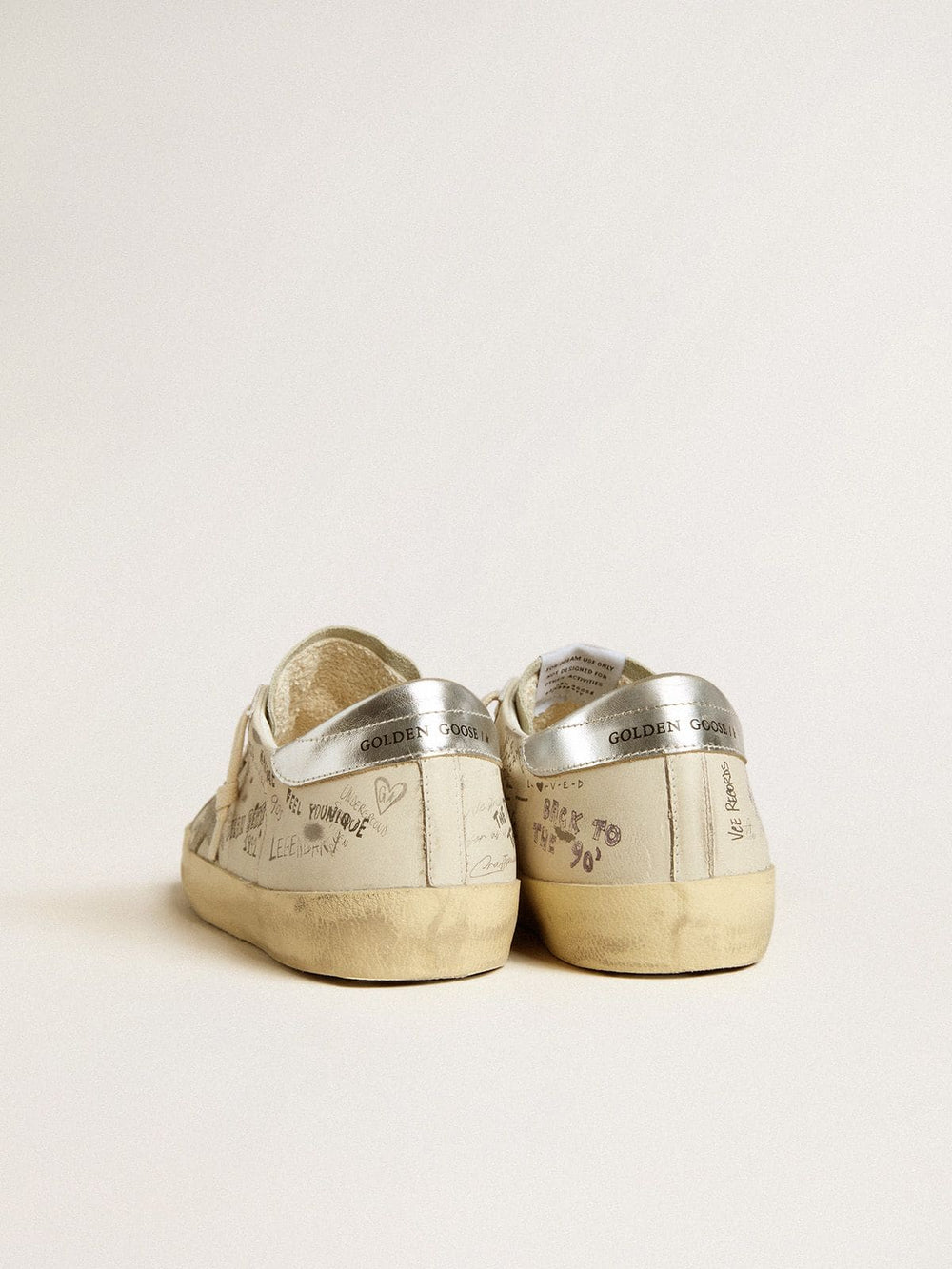 Men's Super-Star  in white leather with all-over lettering and ice-gray suede star