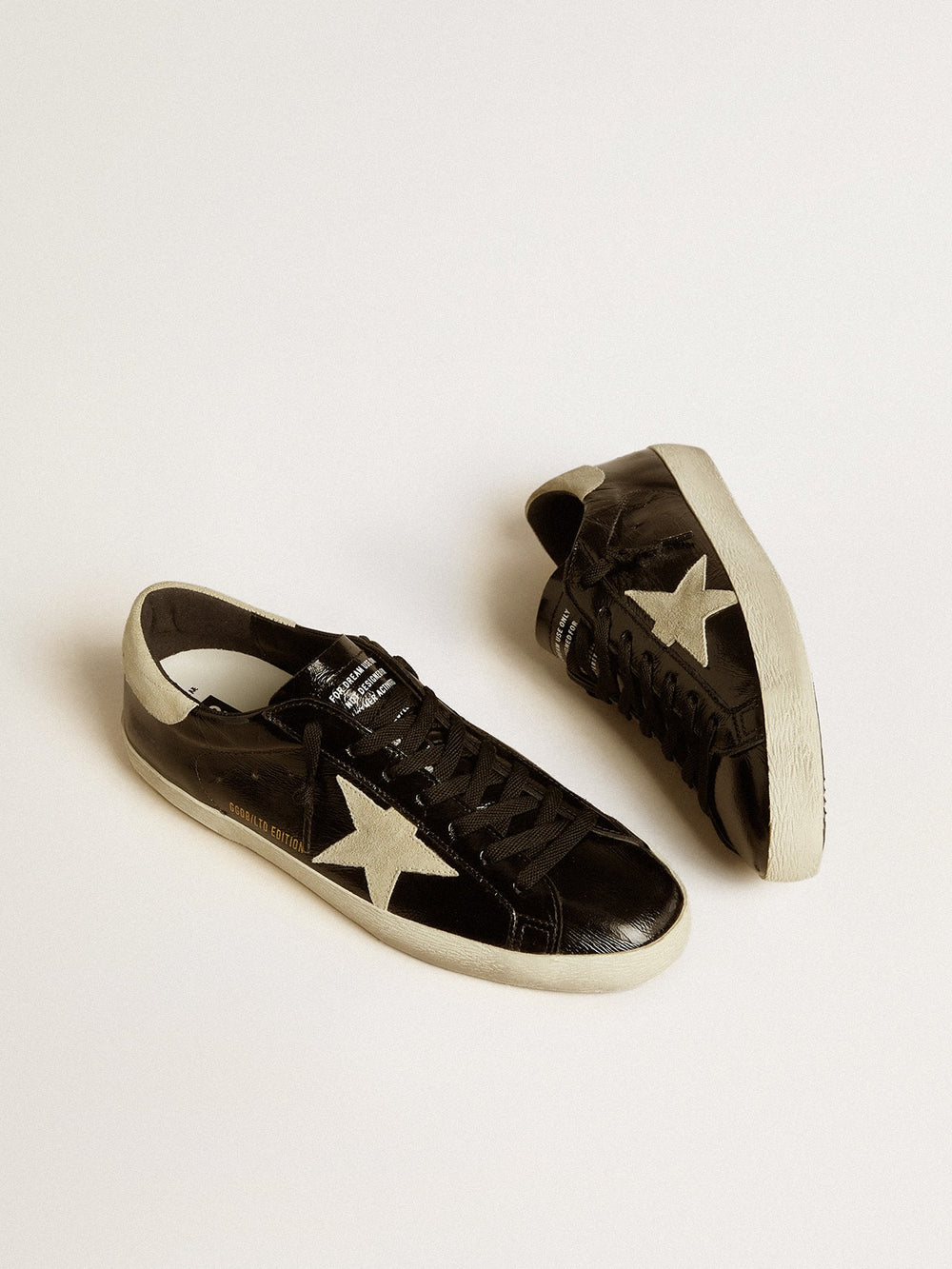 Men's Super-Star  in black patent leather with suede star and heel tab