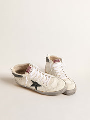 Mid Star with green metallic leather star and white flash