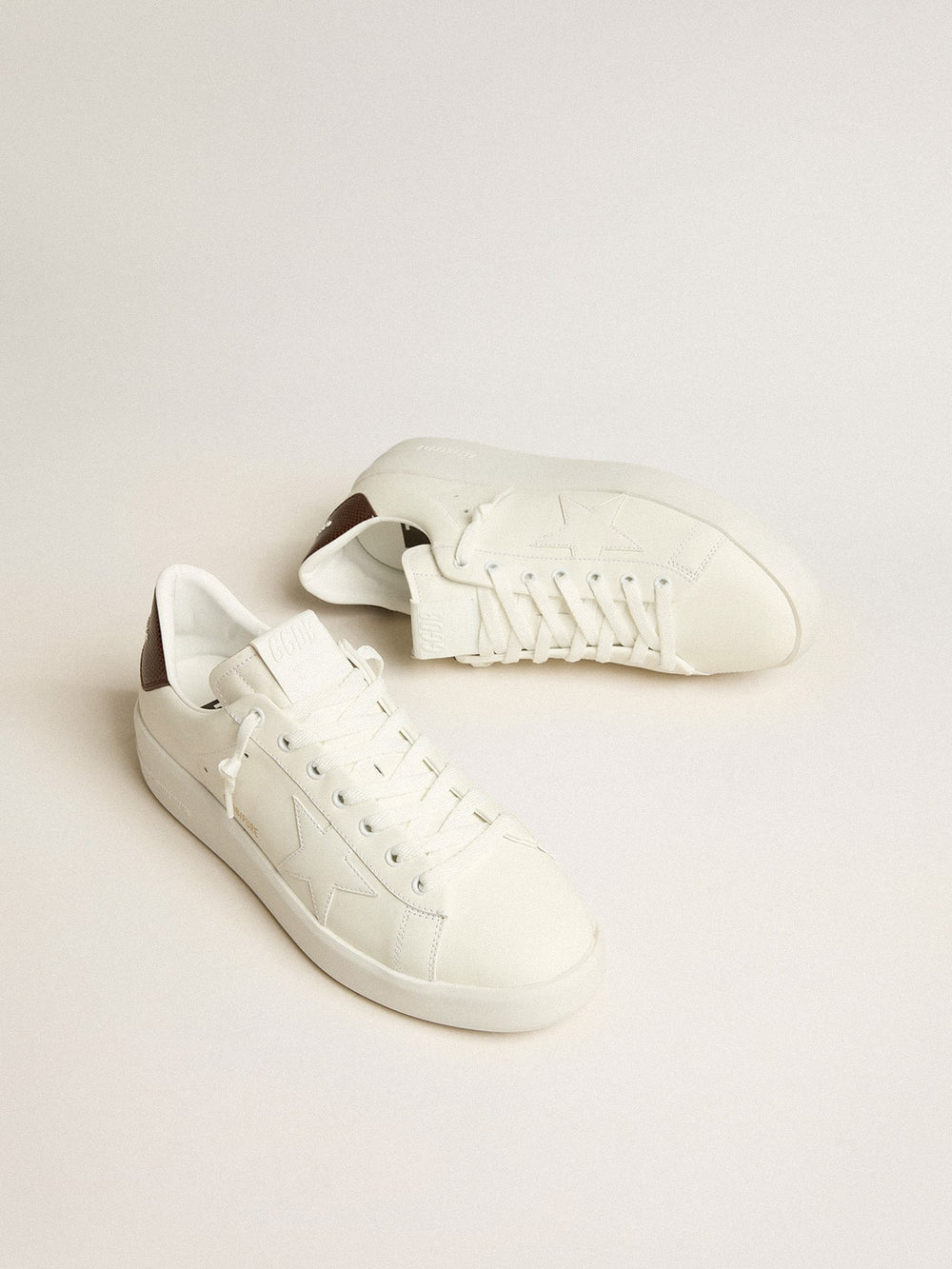 Purestar with white star and burgundy lizard-print heel tab