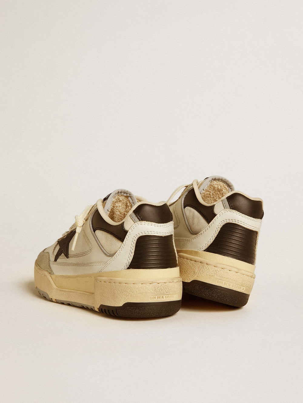 Men’s Forty2 with black star and black leather heel tab