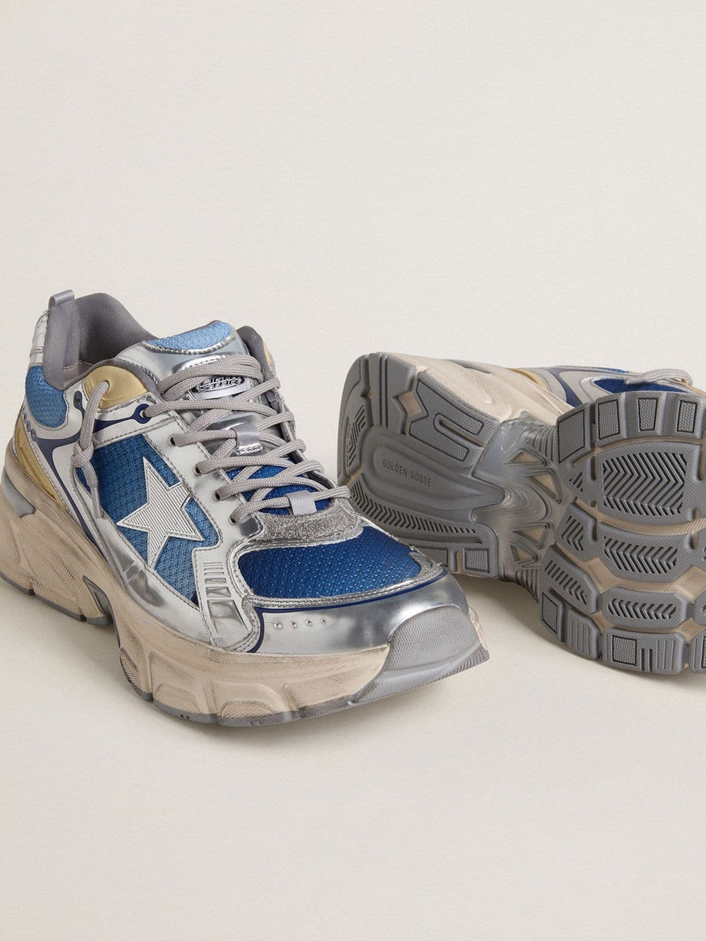Men's Lightstar  in light blue mesh with white TPU star and silver bio-based inserts