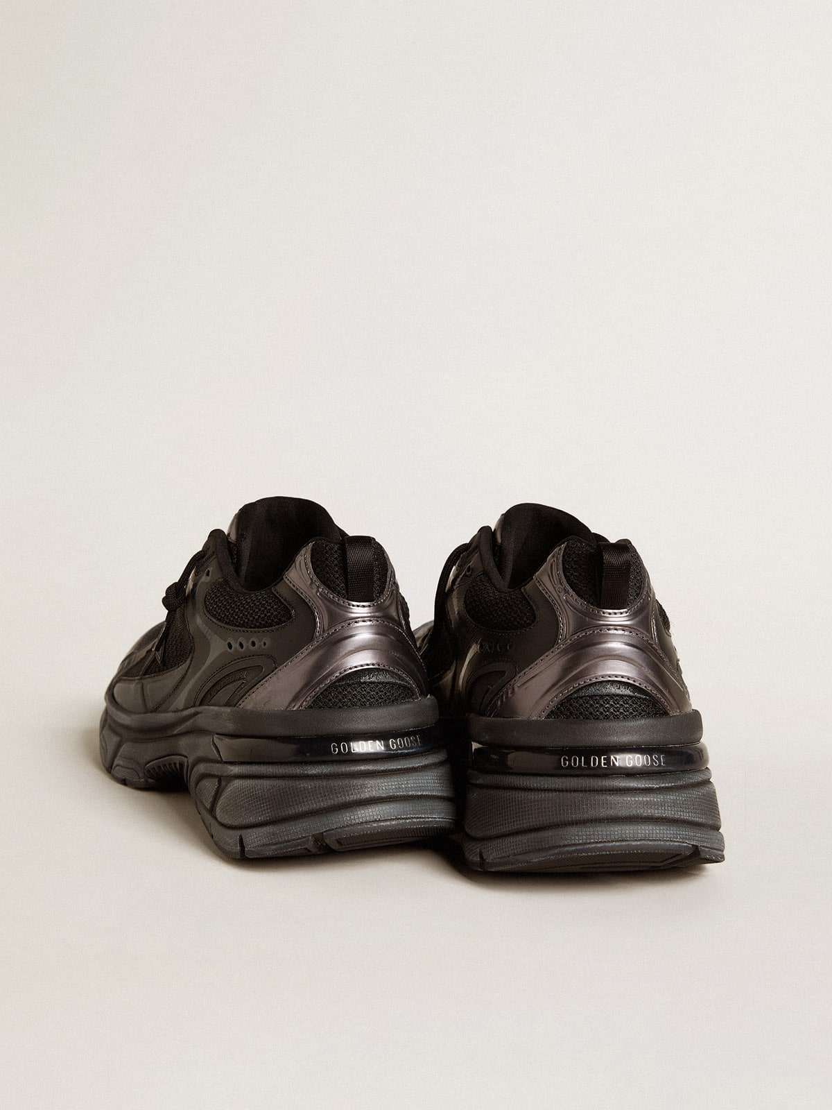 Men’s Lightstar with black leather and mesh upper and black star